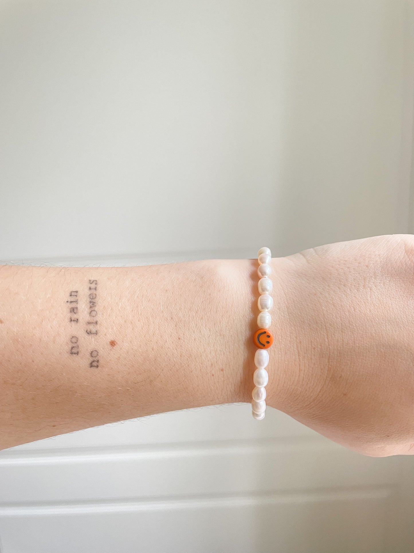 Orange Smiley Pearl Bracelet