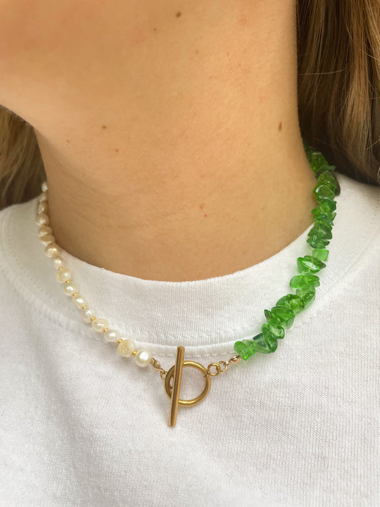 necklace with green irregular stones with freshwater pearls and a gold clasp at the front